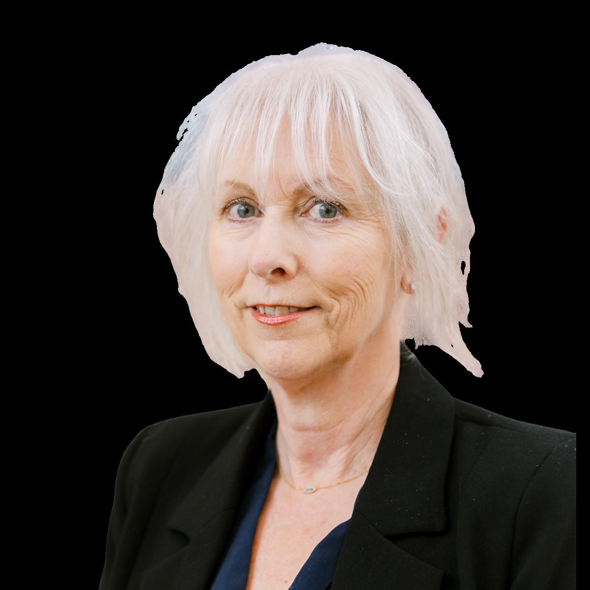 Professional headshot of a female healthcare team member in a black blazer