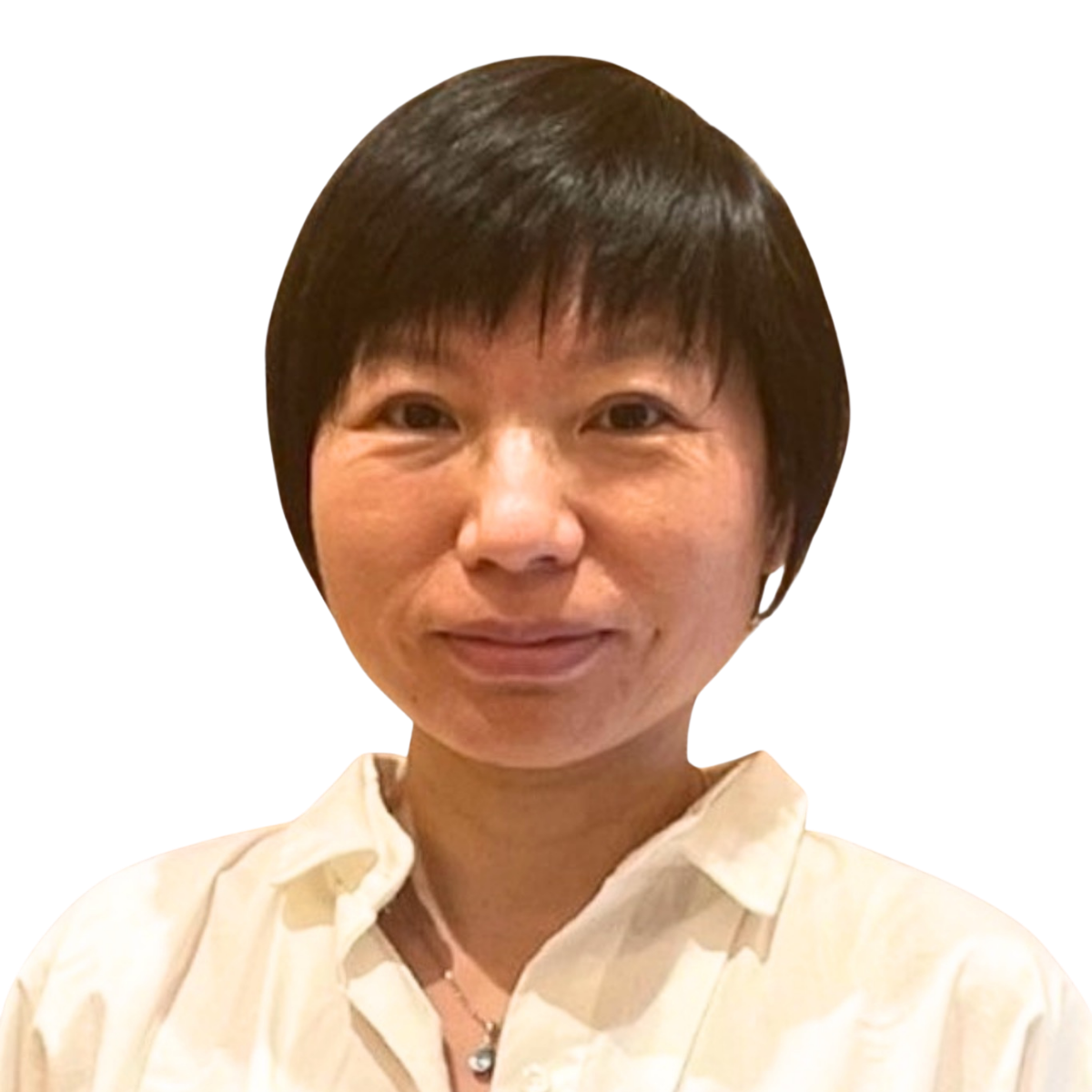 Professional headshot of a female doctor in a white blouse smiling at the camera