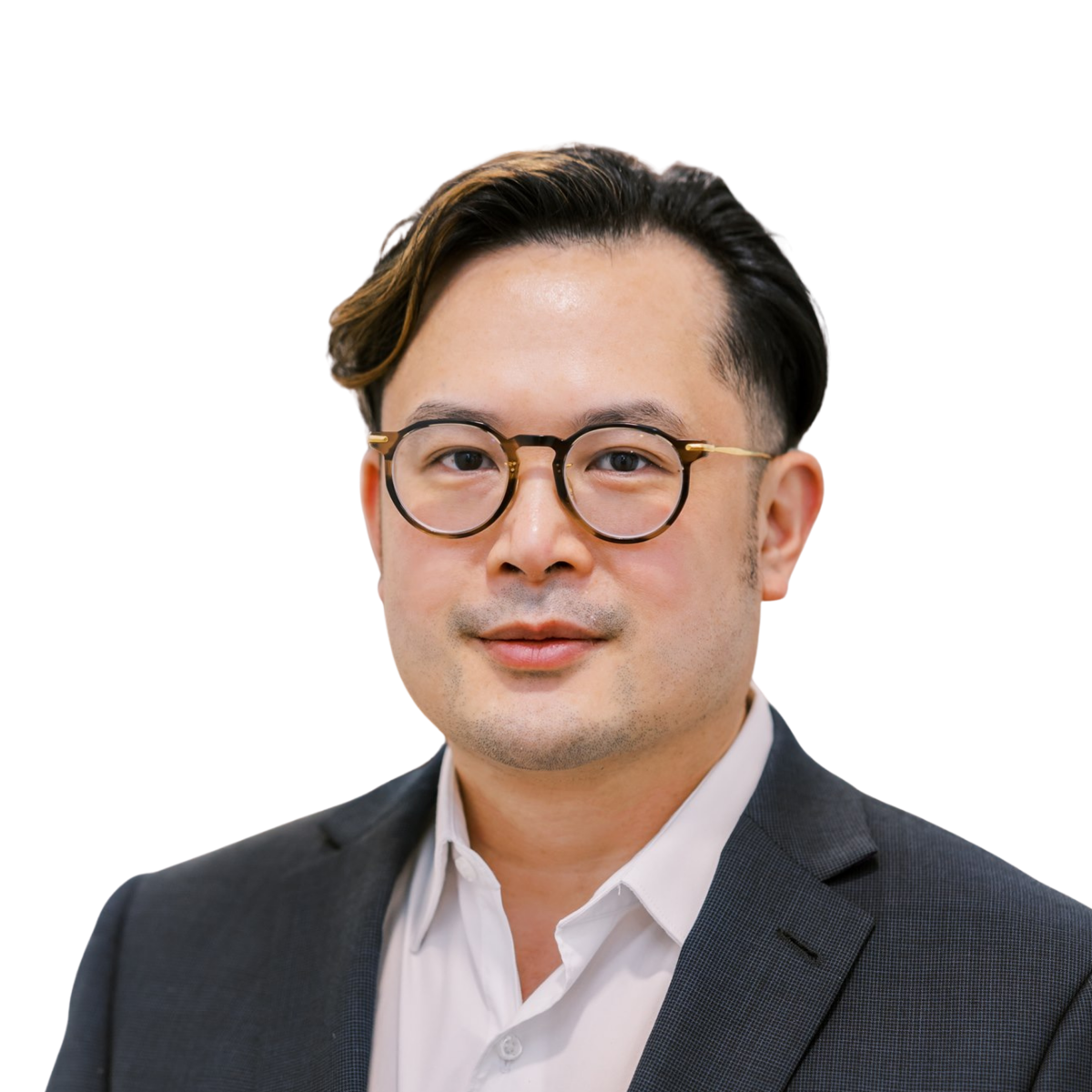 Professional headshot of a male doctor in glasses wearing a dark blazer and white shirt