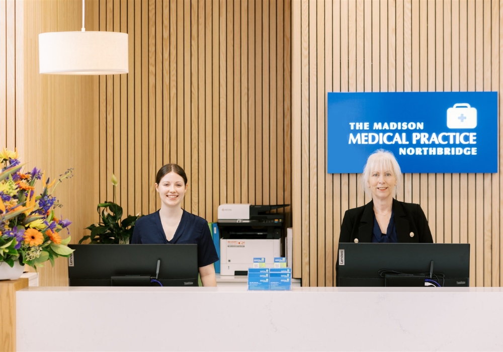 Reception staff at The Madison Medical Practice Northbridge front desk